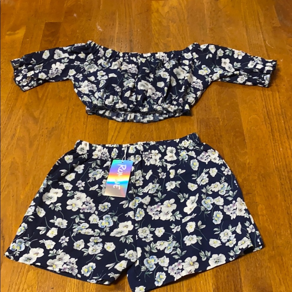 Off the shoulder crop top and shorts set.